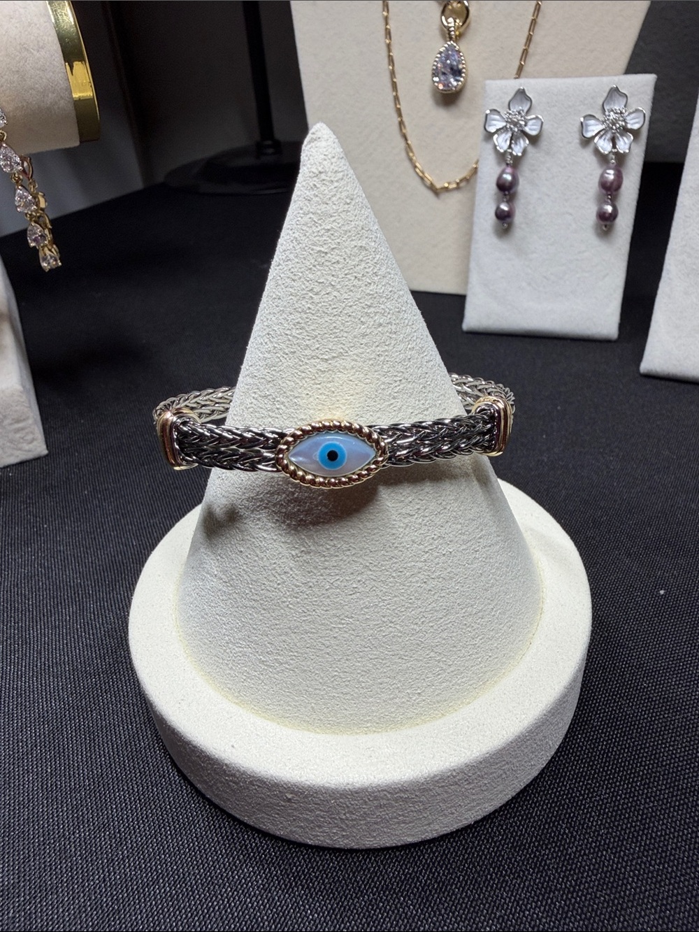18k mixed metal evil eye cuff with mother of pearl eye.  Unisex & adjustable.